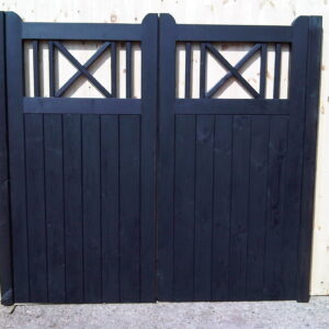 A premium bespoke timber gate featuring an upper open-slat vision panel and a lower section made from solid vertical tongue and groove timber.