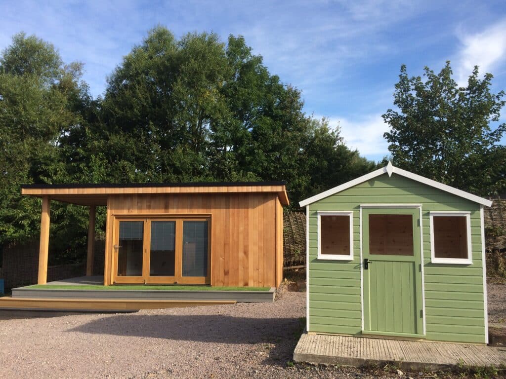 Modern timber garden room with decking, manufactured by 414 Fencing near Hertford and Harlow.