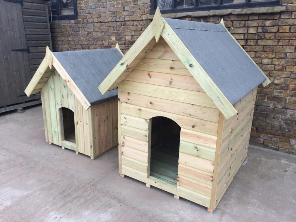 Handcrafted natural timber dog kennels, manufactured by 414 Fencing & Timber Supplies.